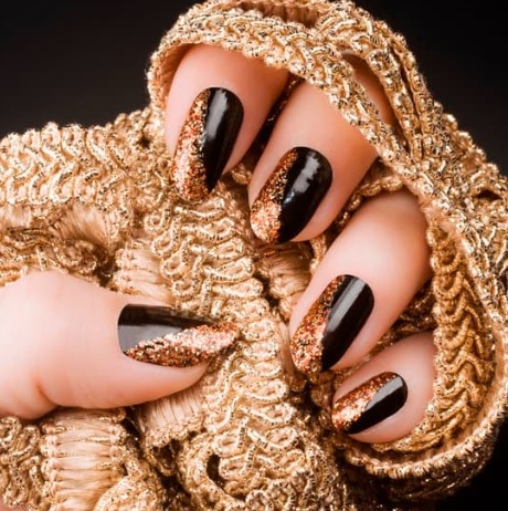 black nails with gold glitter