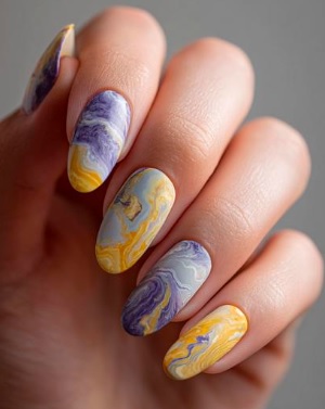 marble nail effect with blue and yellow